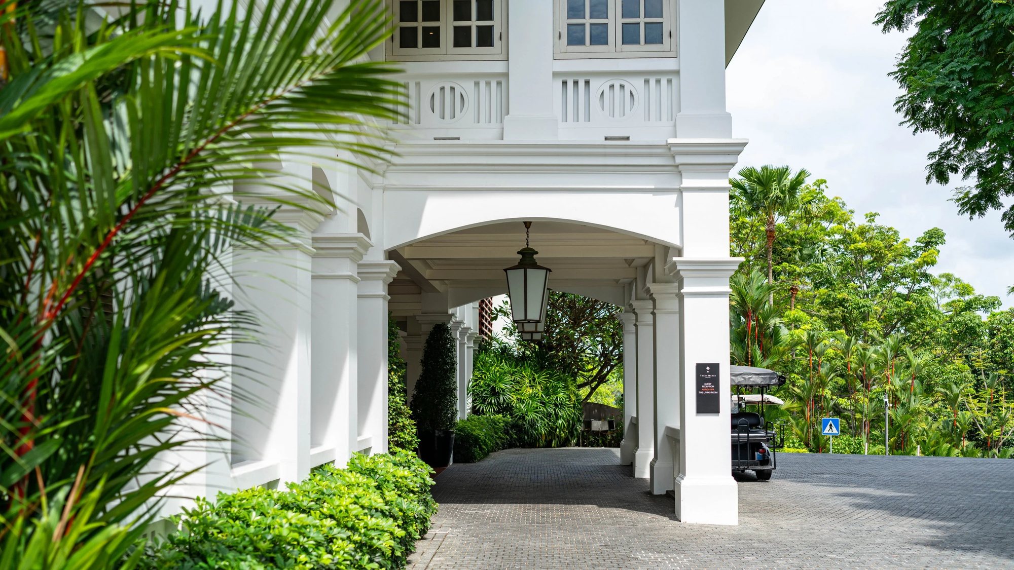 The arched entrance of the colonial building