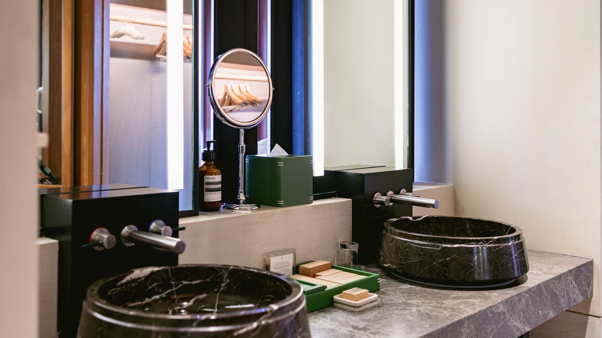Twin dark stone basins in the bathroom