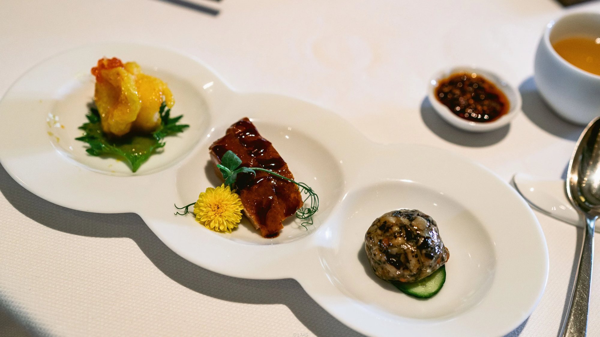 A plate of three dim sum at Cassia