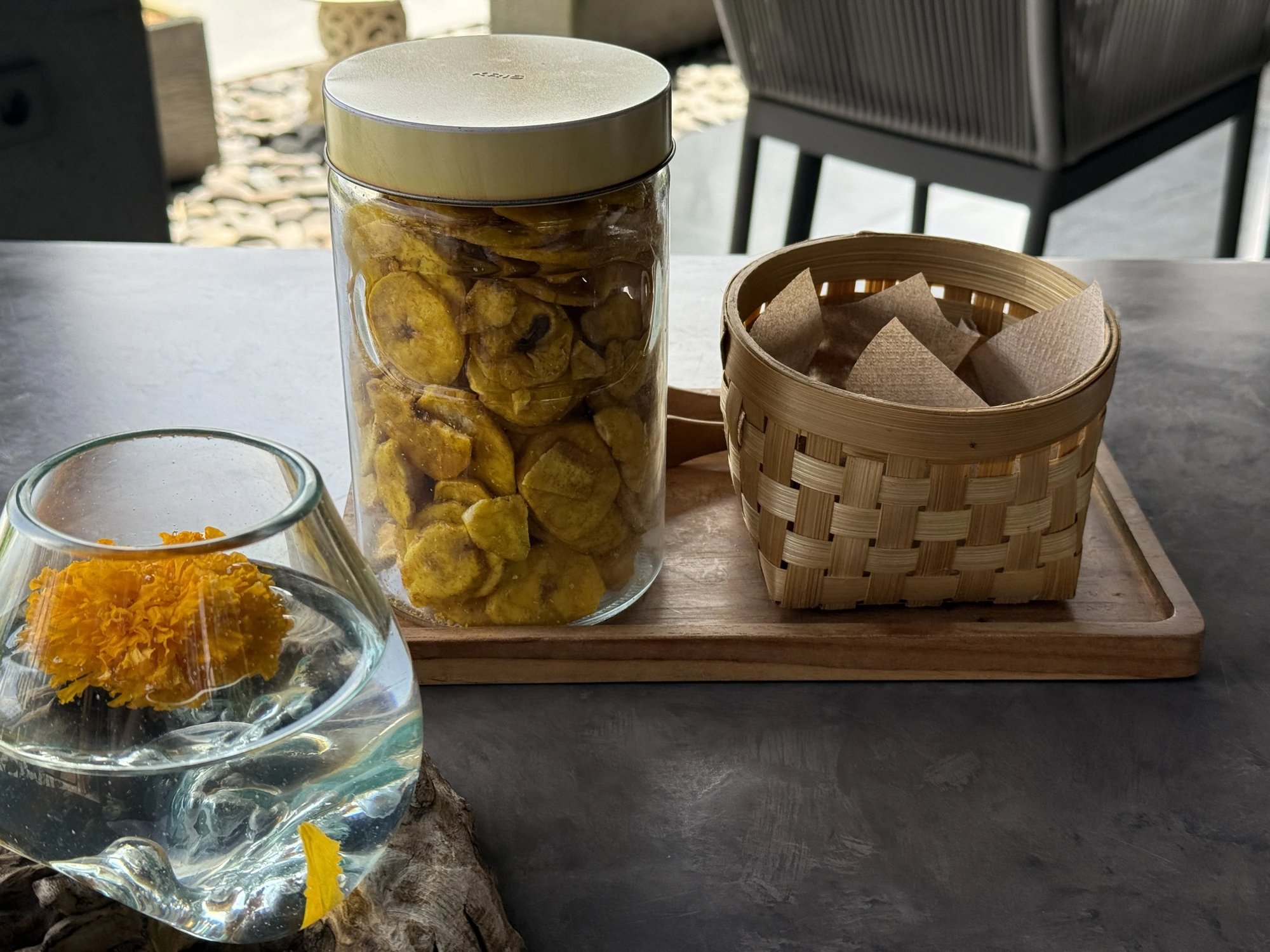 Banana chips and snacks on a tray