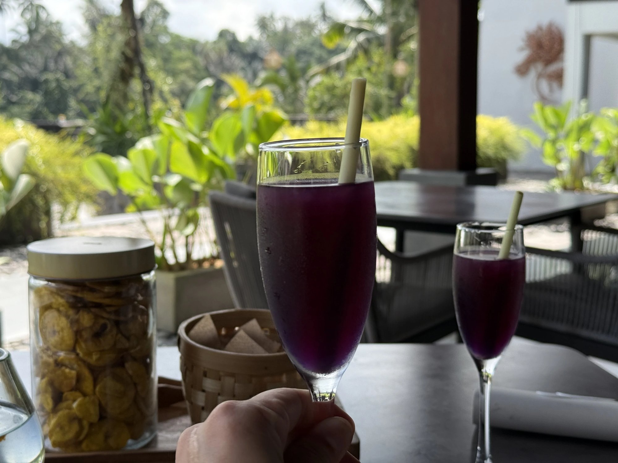 Purple welcome drinks on the restaurant terrace