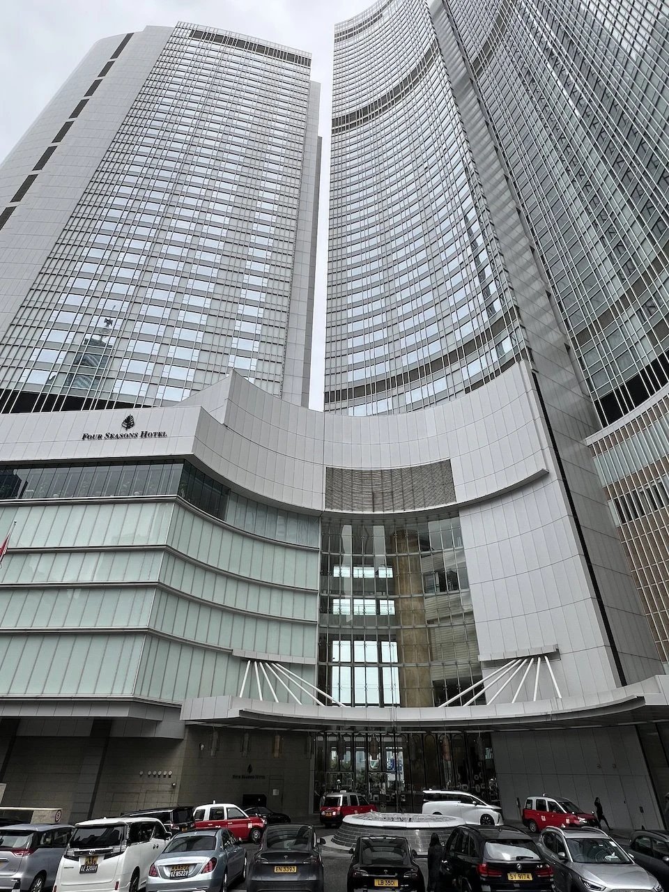 The hotel tower rising above the street
