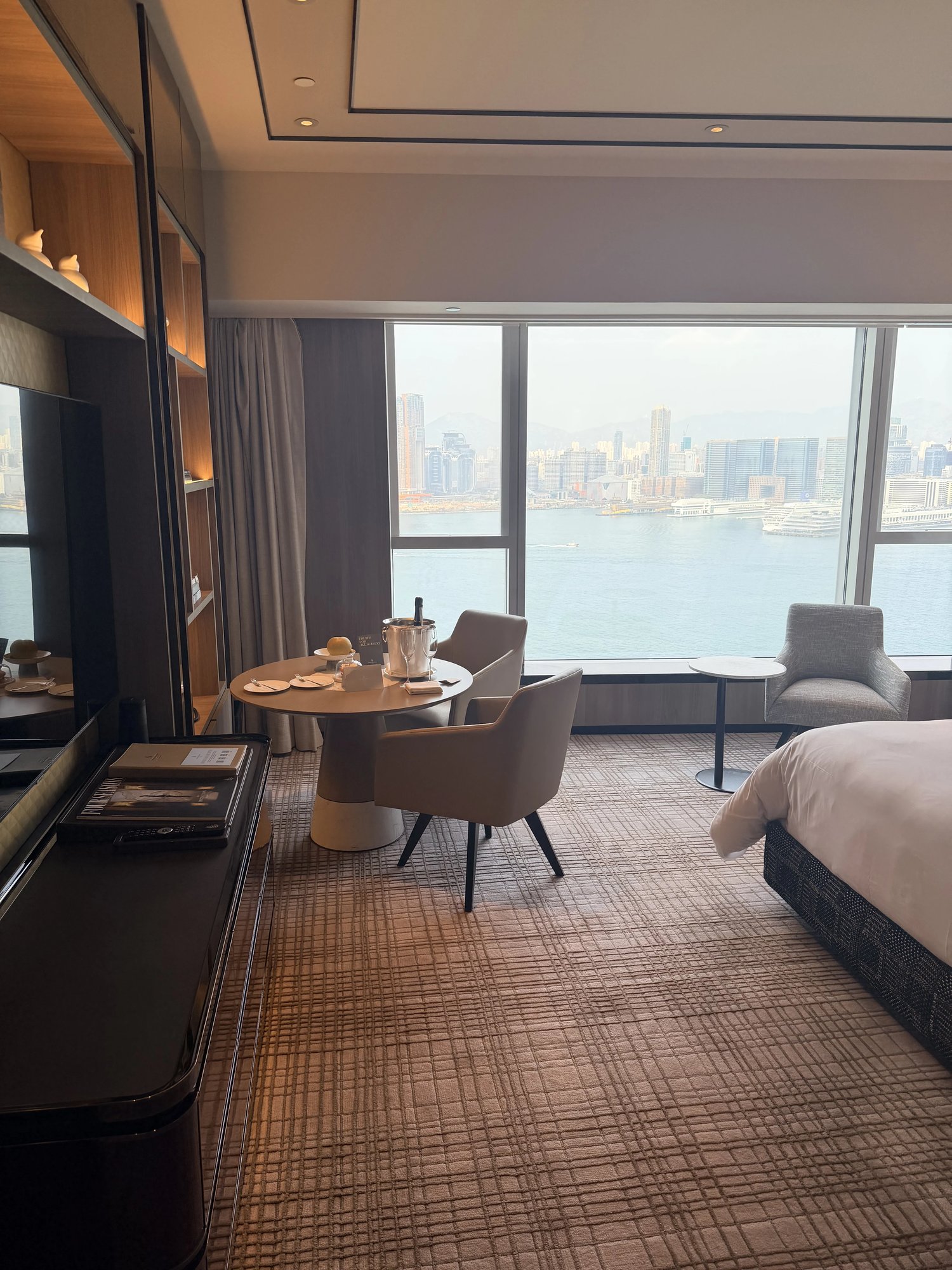 The room with round table and window over the harbour