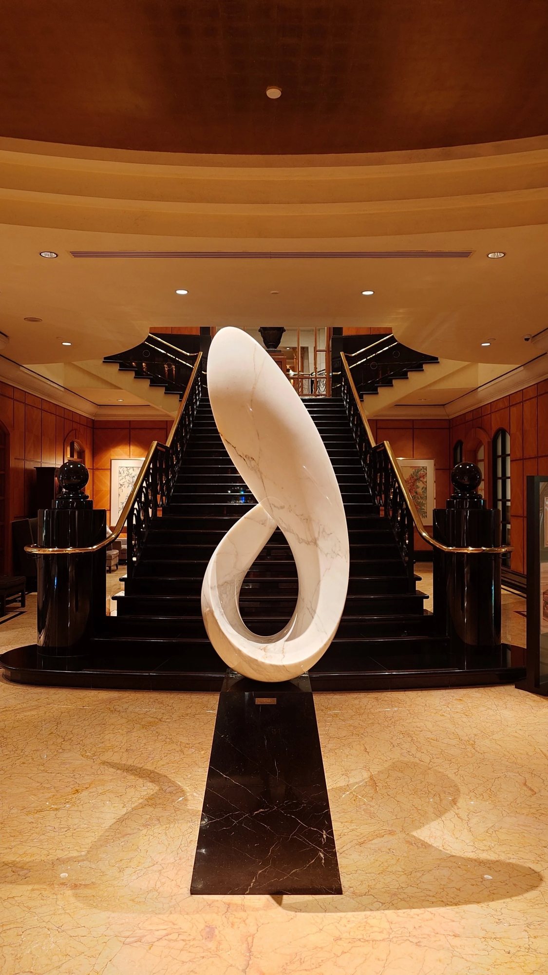 The double staircase and marble sculpture
