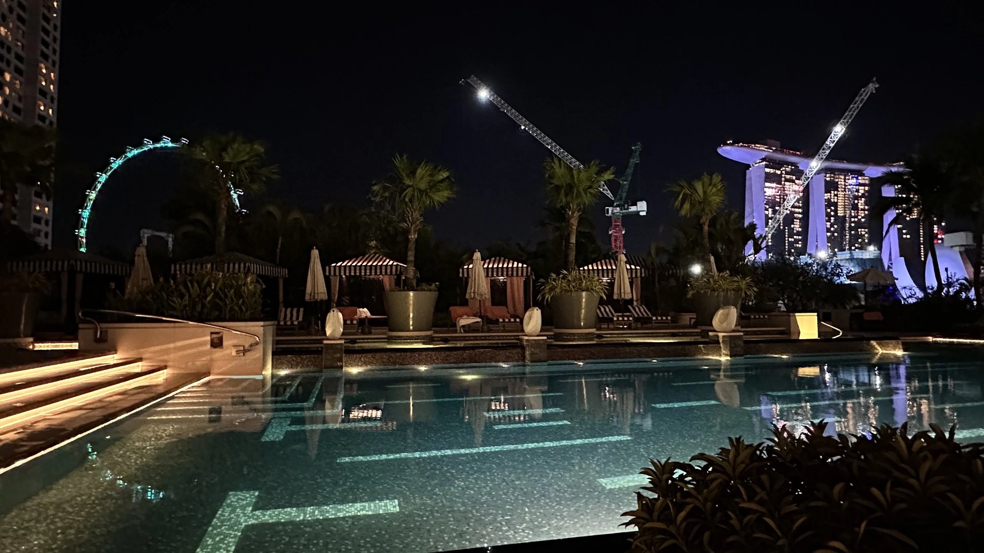 The pool at night with Marina Bay Sands behind
