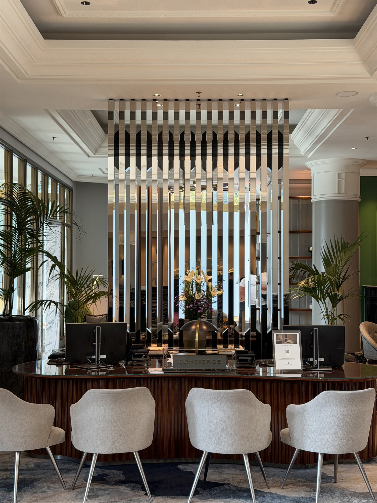 The lobby bar counter behind a mirrored screen