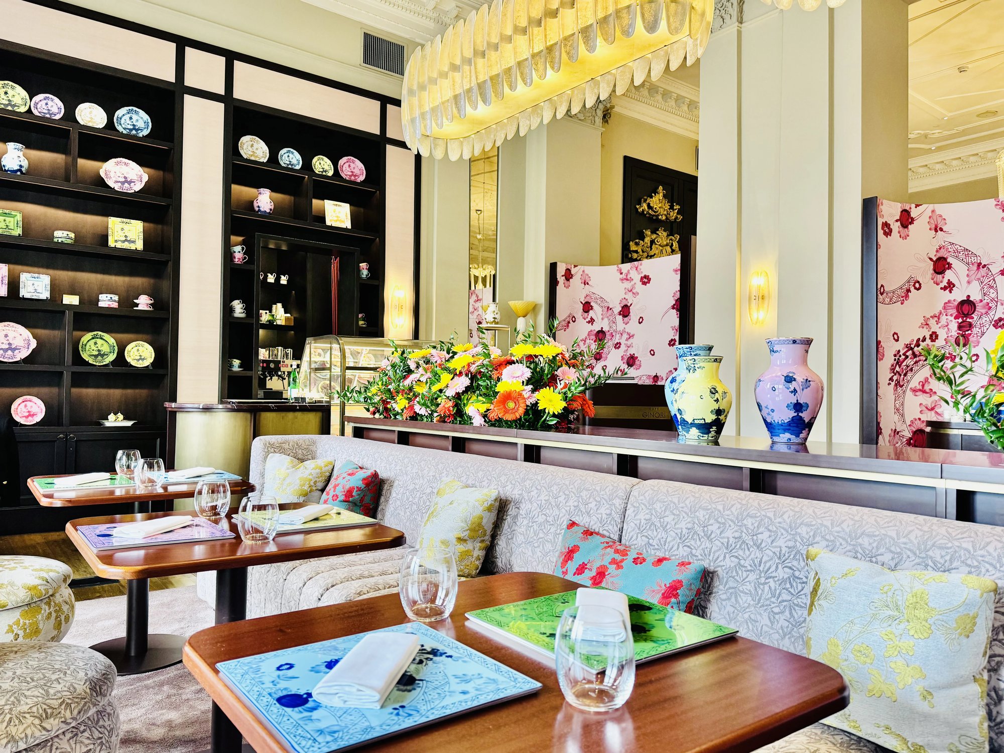 Caffe Ginori dining room with colourful porcelain shelves