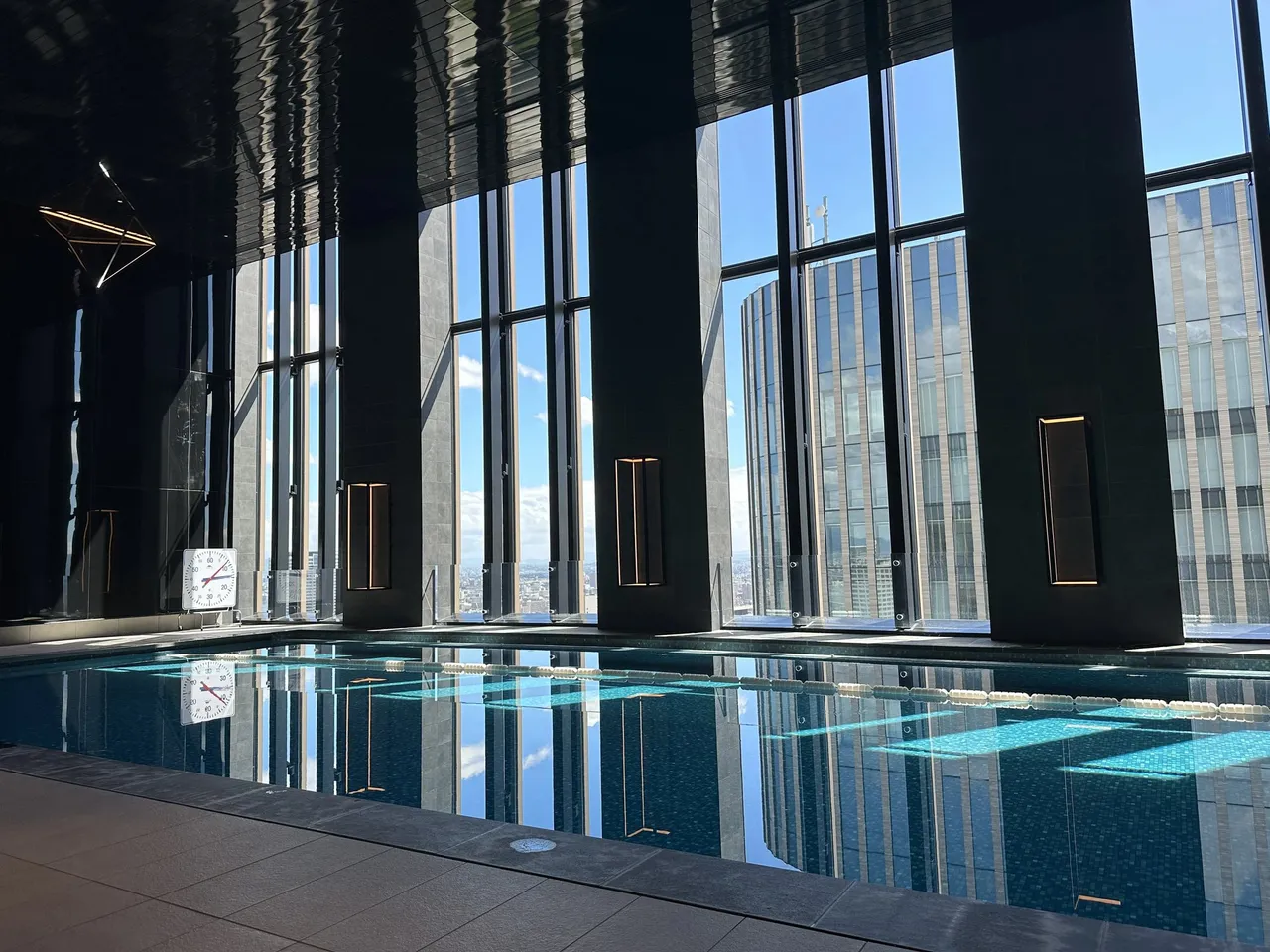 The indoor 25-metre pool beneath tall windows