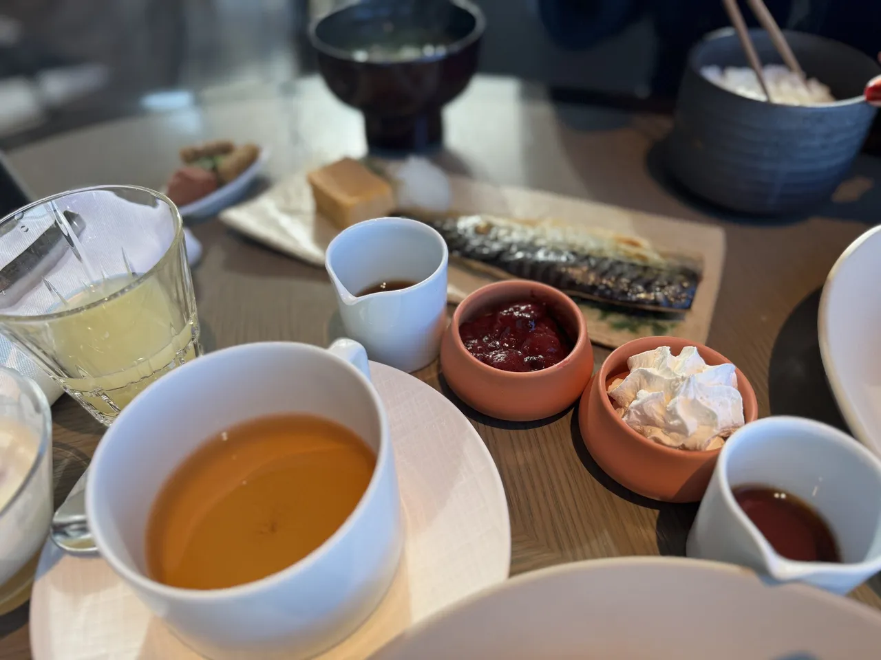 Japanese breakfast with grilled fish and tea