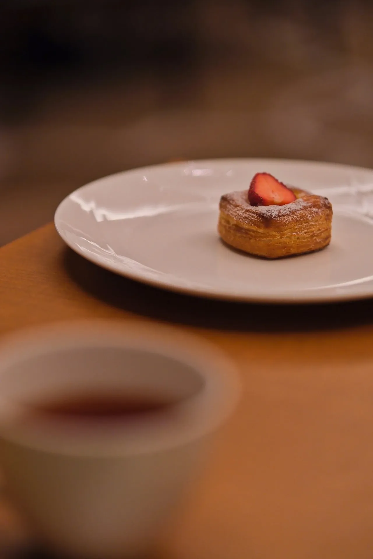 A strawberry pastry and tea in the lounge